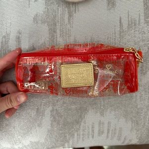 Poppy by Coach travel case